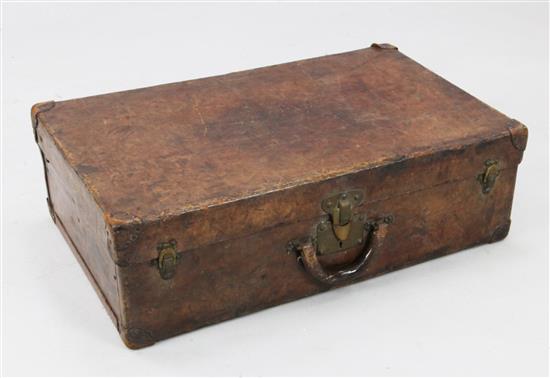 An early 20th century Louis Vuitton brown leather suitcase, 28 x 17 x 9in.